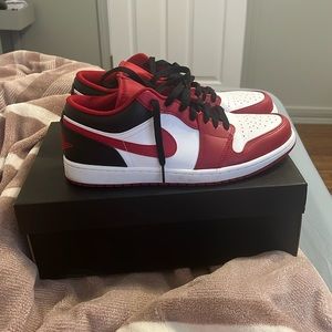 Air Jordan size 10.5 men’s red,black, and white